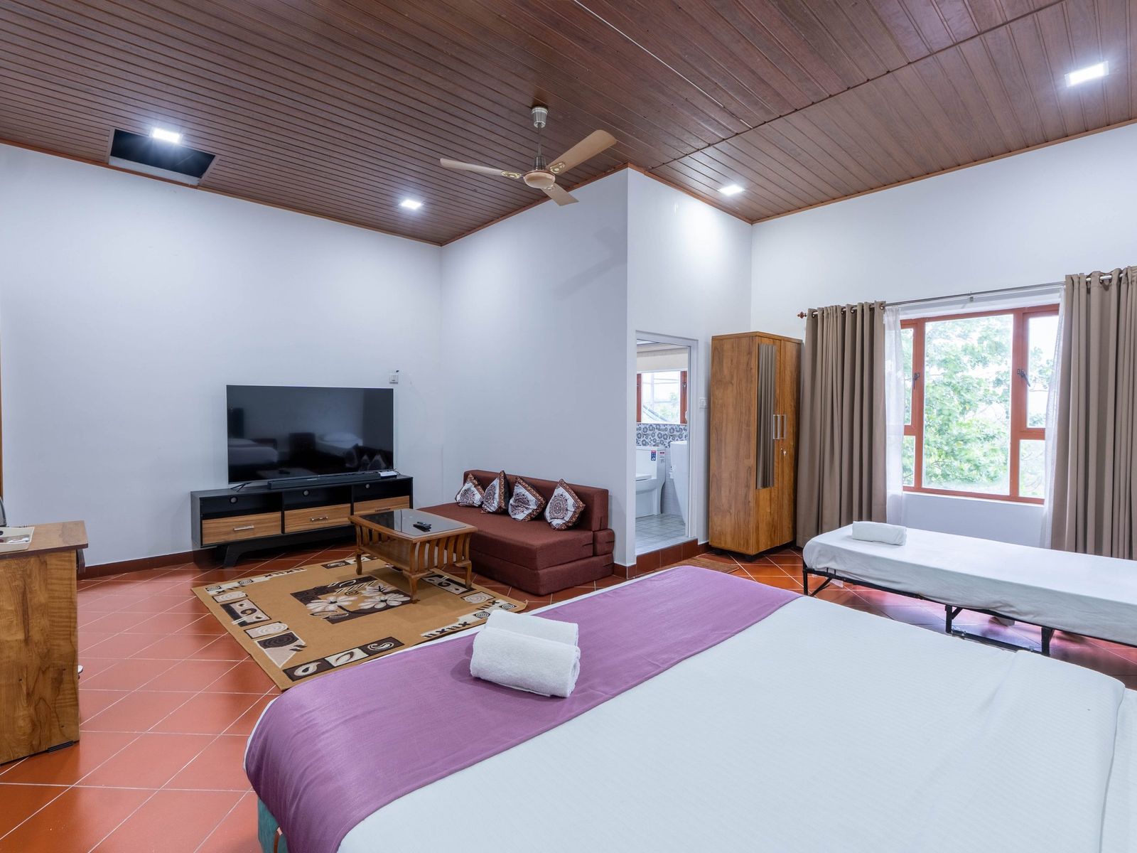 King bed and extra bed in the Family Room at Zen Garden Vagamon