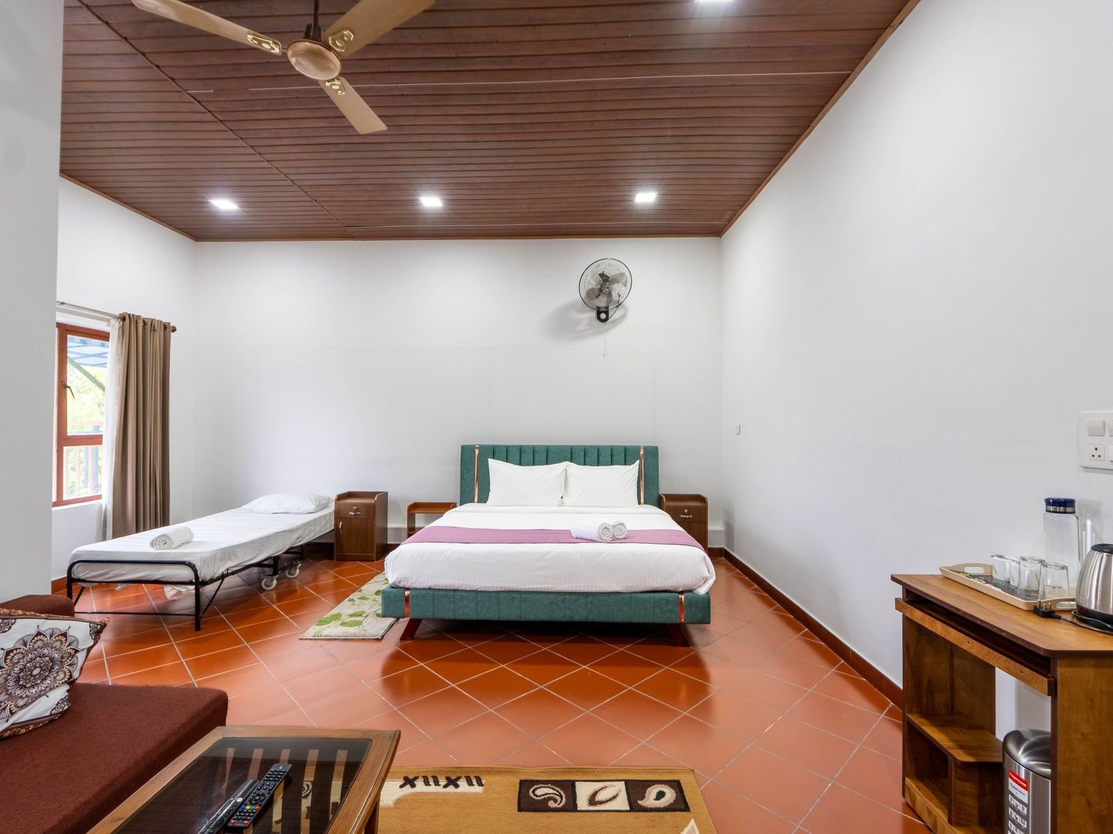 Sitting area with sofa and coffee table in the Family Room at Zen Garden Vagamon